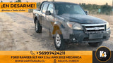 Camioneta Ford Ranger XLT 2012 en desarme de kapitan4x4, vista frontal de vehículo diésel color oscuro en terreno rural