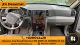 Interior de Jeep Grand Cherokee WK 2008 con tablero, volante y consola central en kapitan4x4