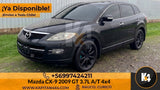 Mazda CX-9 2009 GT 3.7L A/T 4x4 negra, SUV de lujo con llantas negras y pinzas de freno azules. kapitan4x4