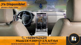 Interior de Mazda CX-9 2009 GT beige cuero, consola central con radio y aire acondicionado, volante multifunción. kapitan4x4
