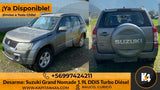 Suzuki Grand Nomade 1.9 DDiS Turbo Diésel (2006-2008) gris, SUV 4x4 con rueda de repuesto en portón trasero. Kapitan 4x4.